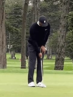 Tiger Woods one-hand putting drill set-up.